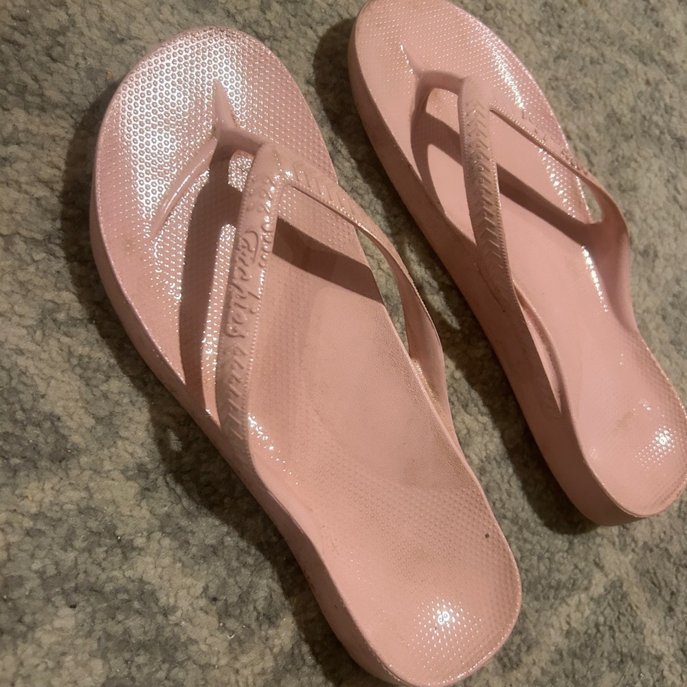 Pink Archies Flip Flops